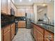 Spacious kitchen with stainless steel appliances and dark countertops at 5524 Elk Knob Ct, Denver, NC 28037