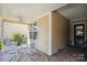 Inviting covered porch with comfortable rocking chairs, ideal for relaxing outdoors at 5524 Elk Knob Ct, Denver, NC 28037