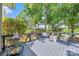 Well-furnished deck with seating and a bar cart, perfect for outdoor entertaining at 5728 Mantario Dr, Charlotte, NC 28269
