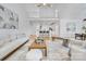 Spacious living room featuring an open floor plan, loft and views to the kitchen and dining area at 5728 Mantario Dr, Charlotte, NC 28269