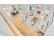 Open-concept home showing living, dining and kitchen areas with lots of natural light at 5728 Mantario Dr, Charlotte, NC 28269