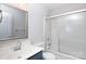 The bathroom has a framed mirror and a shower with sliding glass doors at 5806 Autumn Trace Ln, Indian Trail, NC 28079