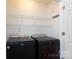 Laundry room featuring a Maytag washer and dryer with shelving at 5806 Autumn Trace Ln, Indian Trail, NC 28079