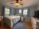 Comfortable bedroom features hardwood floors and natural light at 605 Impala Dr, Albemarle, NC 28001