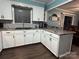 This kitchen features ample countertop space, updated appliances, and plenty of storage, ready for culinary adventures at 605 Impala Dr, Albemarle, NC 28001