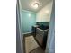 Convenient laundry room includes modern washer and dryer appliances at 605 Impala Dr, Albemarle, NC 28001