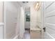 Well-lit bathroom features a bathtub, shower, vanity, and window allowing natural light at 6206 Hunter Ave, Charlotte, NC 28262