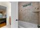 Tub-shower combo with built-in niche and window; ready for relaxation and convenience at 6565 Robin Hollow Dr, Mint Hill, NC 28227