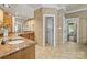 Beautiful bathroom with granite countertop, tiled floor, and decorative cabinets at 6565 Robin Hollow Dr, Mint Hill, NC 28227