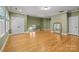 Large bonus room with hardwood floors and lots of windows. Great for recreation or storage at 6565 Robin Hollow Dr, Mint Hill, NC 28227