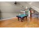 This game room offers a pool table and a built-in wet bar for your at-home enjoyment at 6565 Robin Hollow Dr, Mint Hill, NC 28227