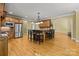 Spacious open-concept kitchen with a large island, stainless steel appliances, and wood cabinetry at 6565 Robin Hollow Dr, Mint Hill, NC 28227