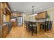 Beautiful kitchen featuring an island with bar stool seating and stainless-steel appliances at 6565 Robin Hollow Dr, Mint Hill, NC 28227