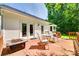 Relaxing back deck features outdoor seating and a fire pit, ideal for entertaining at 675 Ormand Rd, York, SC 29745