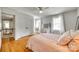 Bright bedroom with hardwood floors, natural light and a hanging hammock chair in the corner at 675 Ormand Rd, York, SC 29745