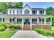 Charming two-story home with a welcoming front porch and meticulously landscaped yard at 675 Ormand Rd, York, SC 29745
