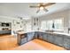 Bright kitchen with sleek gray cabinetry, stainless steel appliances, and tiled floor at 675 Ormand Rd, York, SC 29745
