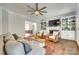 Inviting living room with a fireplace, built-in shelves, and ample natural light at 675 Ormand Rd, York, SC 29745