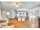 Open-concept living room featuring hardwood floors, neutral decor, and ample natural light at 675 Ormand Rd, York, SC 29745