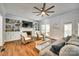 Cozy living room with built-in shelving, a fireplace, and comfortable seating at 675 Ormand Rd, York, SC 29745