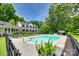 Inviting swimming pool surrounded by lush greenery, ideal for summer fun and relaxation at 675 Ormand Rd, York, SC 29745