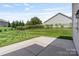 Well-maintained backyard with lush lawn, fence, and view of home's exterior at 7129 Dove Field Ln, Fort Mill, SC 29707