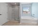Bathroom featuring separate shower and tub at 7129 Dove Field Ln, Fort Mill, SC 29707