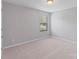 A bedroom features carpet, a ceiling light, and a window at 7129 Dove Field Ln, Fort Mill, SC 29707