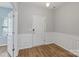 Welcoming foyer with beautiful trim and hardwood floors at 7129 Dove Field Ln, Fort Mill, SC 29707