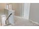 Hallway with neutral carpet leading to bedrooms at 7129 Dove Field Ln, Fort Mill, SC 29707