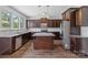 Spacious kitchen featuring a center island, stainless steel appliances, and granite countertops at 7129 Dove Field Ln, Fort Mill, SC 29707