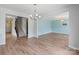 Open living room with staircase access and light blue wall at 7129 Dove Field Ln, Fort Mill, SC 29707