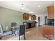 Kitchen with wooden cabinets and black appliances, with space for an eat-in dining table at 7136 Bullock Dr, Charlotte, NC 28214
