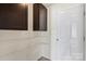 Pantry featuring built-in shelving and a door, providing ample storage space at 7136 Bullock Dr, Charlotte, NC 28214