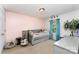 Cozy bedroom with a daybed, complemented by a playful decor and ample natural light at 7218 Cascading Pines Dr, Fort Mill, SC 29708