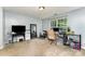 Bright bedroom featuring a comfortable workspace with natural light and neutral carpet at 7218 Cascading Pines Dr, Fort Mill, SC 29708