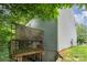 Exterior of home with multi-level deck and covered patio in a wooded backyard at 7218 Cascading Pines Dr, Fort Mill, SC 29708