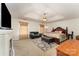 Expansive main bedroom with a tray ceiling, a comfortable sitting area, and luxurious furnishings at 7218 Cascading Pines Dr, Fort Mill, SC 29708
