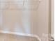 Spacious closet featuring shelving units and carpeting at 8032 Joy Crossing Ln, Charlotte, NC 28214