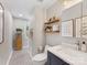Bathroom featuring tiled floors, a floating vanity, and modern fixtures at 911 Munday Ct, Charlotte, NC 28270