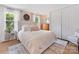 Comfortable bedroom with two windows, a cozy bed, and a spacious closet at 911 Munday Ct, Charlotte, NC 28270