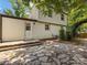 The exterior of the home features an outdoor area with stone pavers at 911 Munday Ct, Charlotte, NC 28270