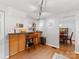 Kitchen breakfast bar with granite countertops, stainless steel appliances and wood cabinets at 911 Munday Ct, Charlotte, NC 28270