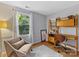 Bright office space with a modern desk, chair, natural light and minimalist decor at 911 Munday Ct, Charlotte, NC 28270