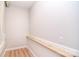 Basement nook with baseboard trim and chair rail detail featuring wood-look flooring at 9117 Castle Garden Ln, Charlotte, NC 28215