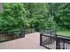View of deck overlooking lush greenery at 9117 Castle Garden Ln, Charlotte, NC 28215