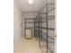 Storage room with metal shelving and brick wall accents at 9117 Castle Garden Ln, Charlotte, NC 28215