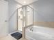 Clean bathroom featuring a glass shower and a separate soaking tub at 9123 Magnolia Lily Ave, Charlotte, NC 28227