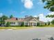 Beautiful community clubhouse with inviting entrance and landscaping at 9123 Magnolia Lily Ave, Charlotte, NC 28227