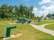Community playground with slide, swings, and climbing features at 9123 Magnolia Lily Ave, Charlotte, NC 28227